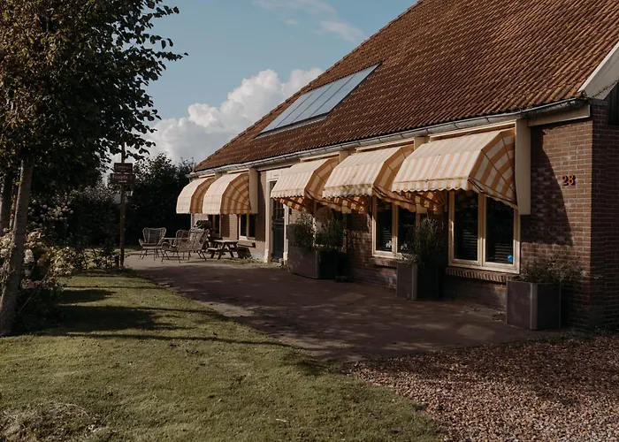 Trekkershut De Tulpenweide * 브리잔드